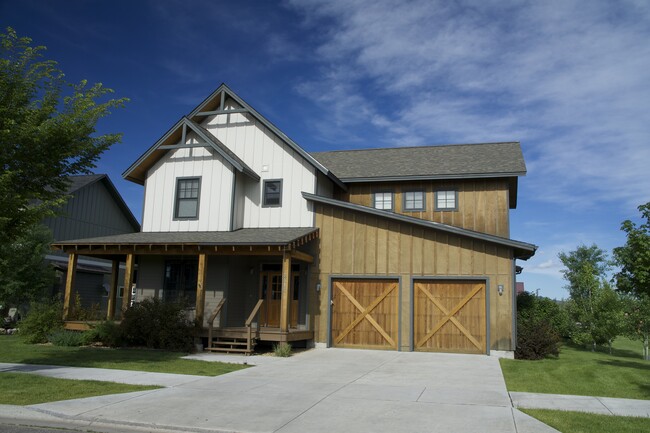 Front of house with two car attached garage. - 2414 Arabian Ave