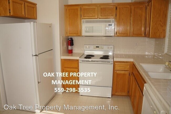 Building Photo - 3 br, 2 bath House - 5490 N. Delbert Avenue