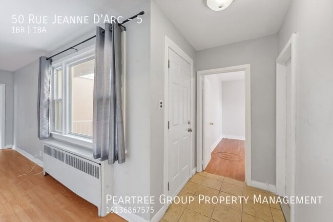 Photo du bâtiment - Joyful Jeanne-D'Arc-1 bed apartment for rent