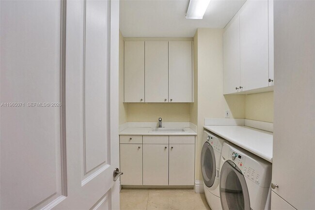 Building Photo - 10295 Collins Ave