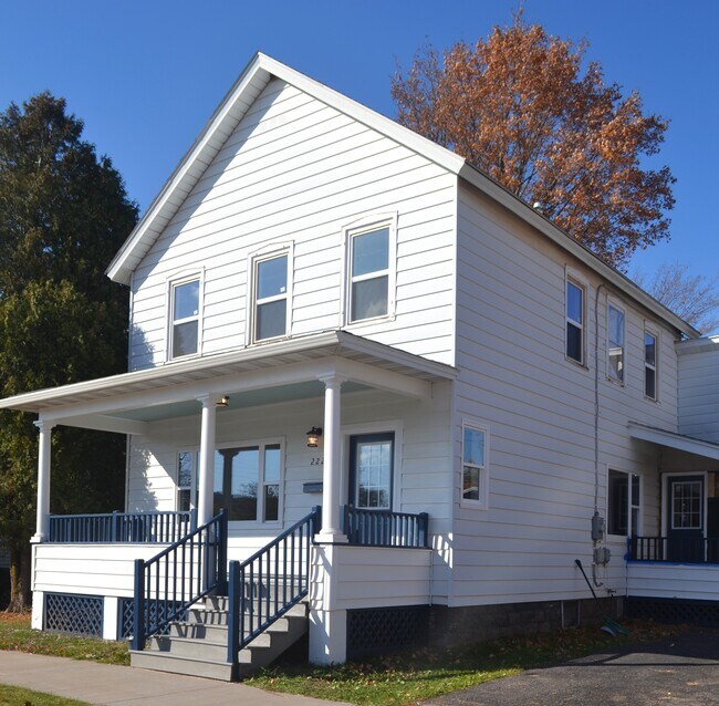 covered front and back porches - 222 W Peck St
