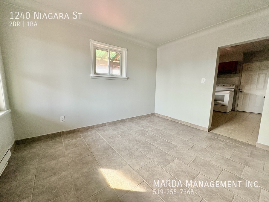 Primary Photo - BRIGHT AND COZY 2BEDROOM/1BATH UPPER UNIT ...