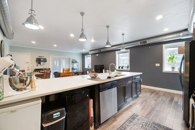 Building Photo - MASSIVE MODERN RENOVATION WITH OPEN LAYOUT...