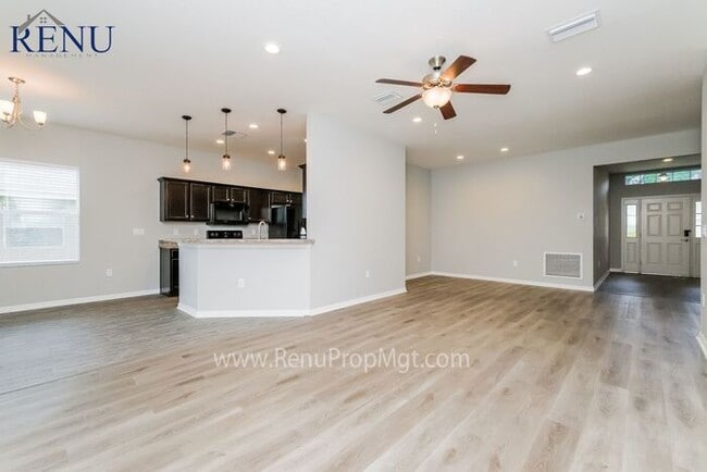 Building Photo - Spring into savings with 1/2 off your firs...