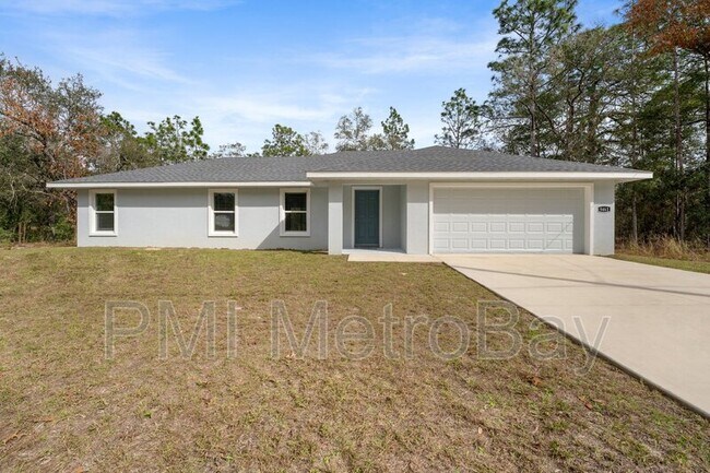 Foto del edificio - 9461 N Sandree Dr
