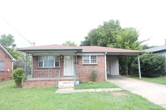 Building Photo - 716 24th Ave W