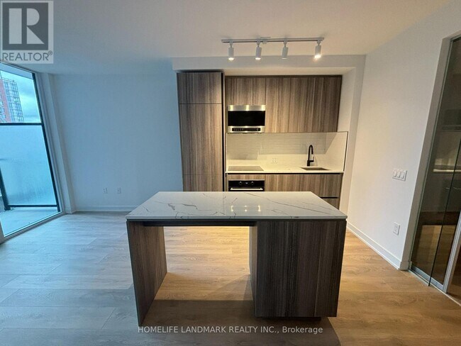 Photo du bâtiment - 117 Broadway Ave
