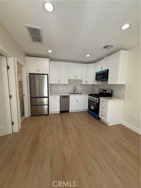 Building Photo - 6227 Wilkinson Ave