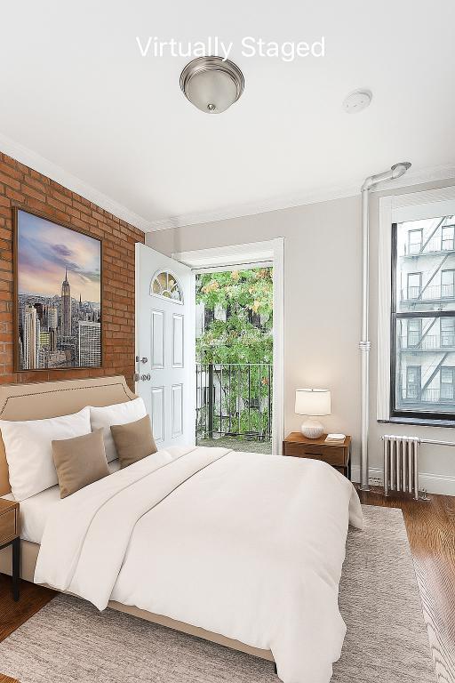 Foto del edificio - 422 E 9th St