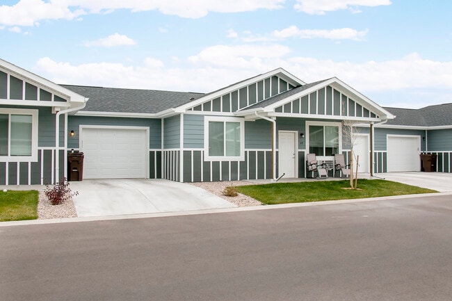 Attached garage - Country West Patio Home Apartments