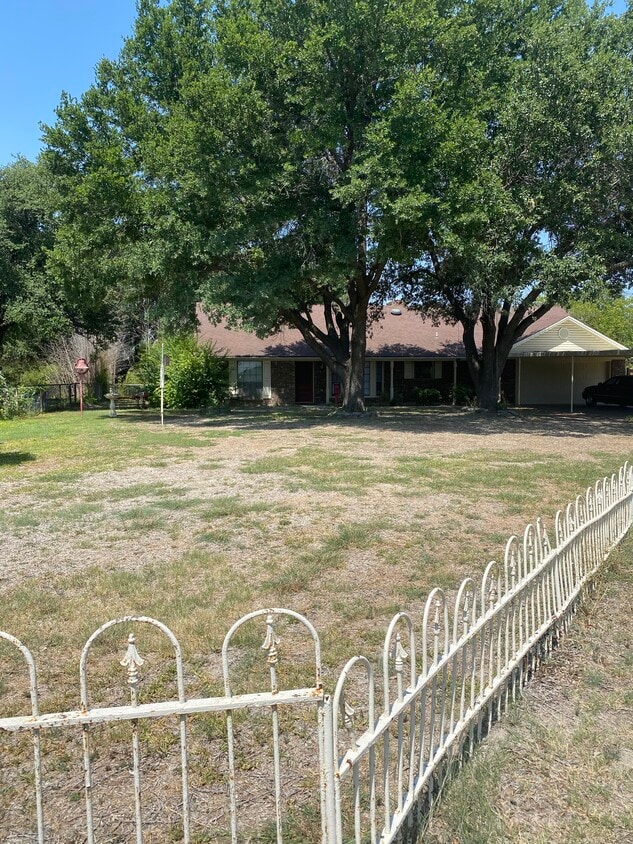 Front of house with garage and carport - 8040 Vista del Sol St