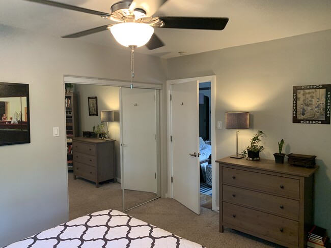 Bedroom has a mirrored closet. - 636 N Washington St