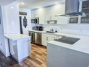 Building Photo - 7830 Dickens Ave