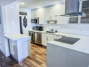 Building Photo - 7830 Dickens Ave