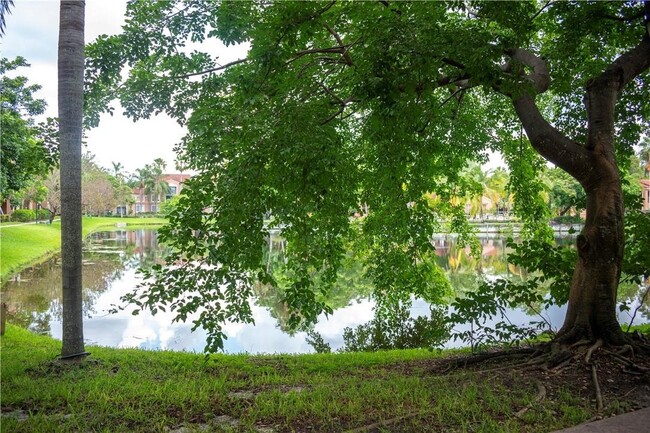 Building Photo - 4828 U.S. 441 Apt #8102, Coconut Creek, FL...