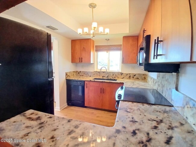 Building Photo - 325 S Banana River Blvd