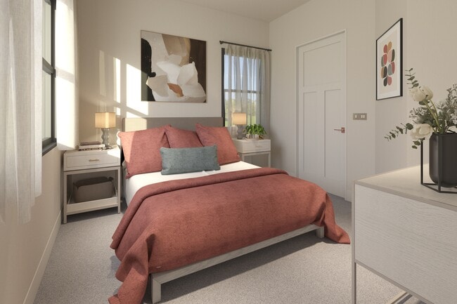 Habitación de un apartamento en Greenwood Commons que muestra una posible distribución del mobiliario. - Greenwood Commons Apartments