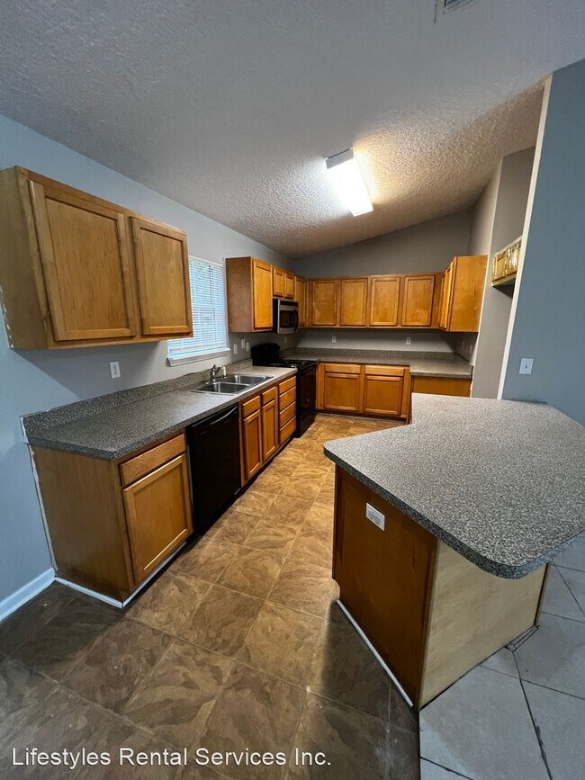 3 br, 2 bath House - 7651 Bob-o-link photo'