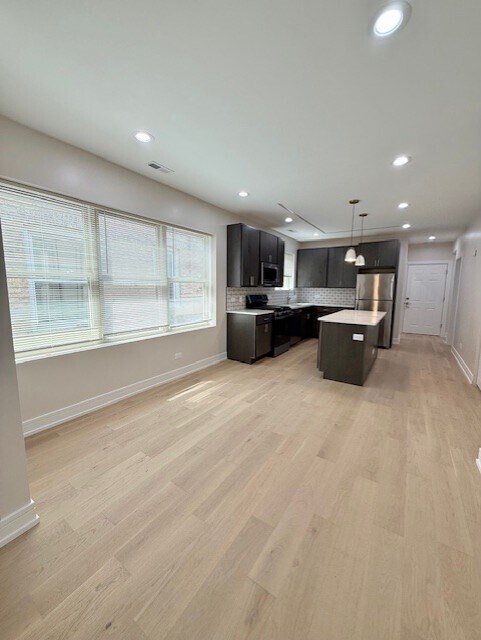 Foto del edificio - 5852 N Artesian Ave