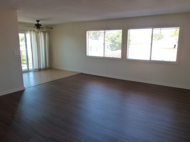 view of living room looking into dining room - 3921 S Pacific Ave