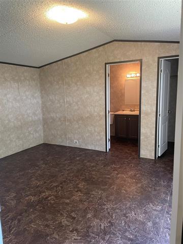 Foto del edificio - 6000 Spring Creek Pkwy