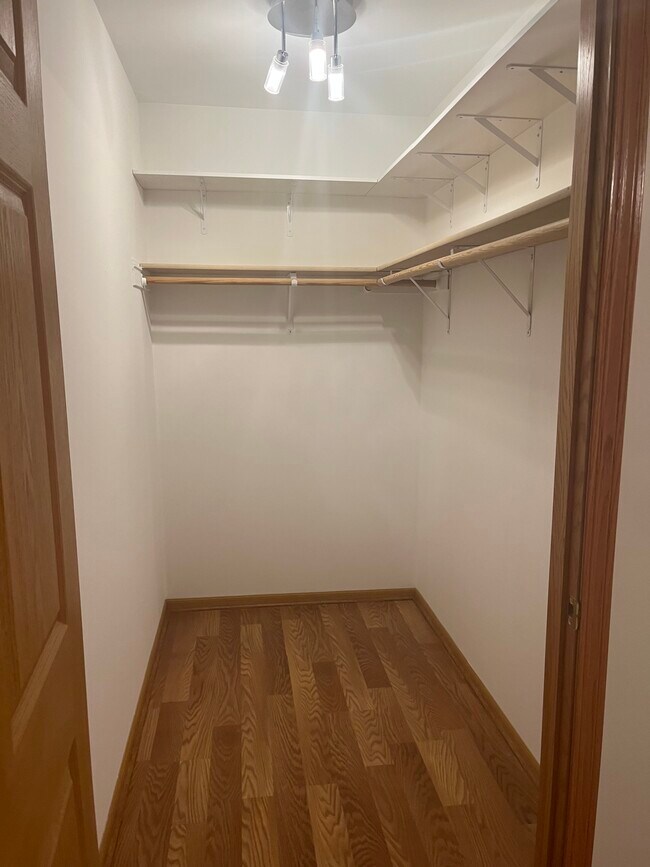 Primary walk in closet - 8507 Hill Top Ct