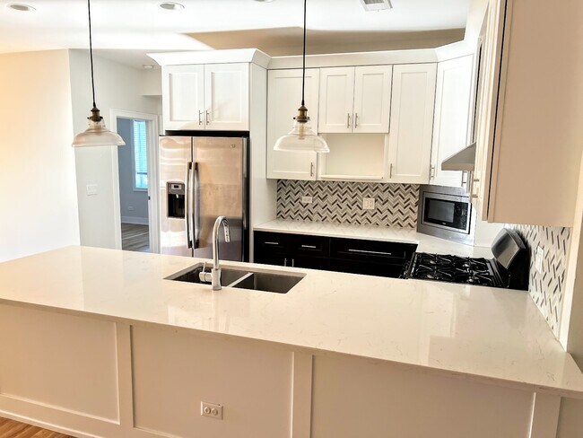 Foto del edificio - 3203 N Ridgeway Ave