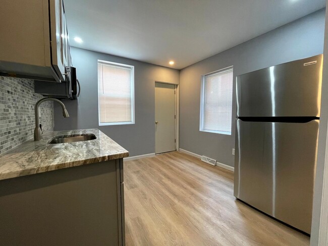 Building Photo - Remodeled 3BR House Steps to LaSalle Unive...