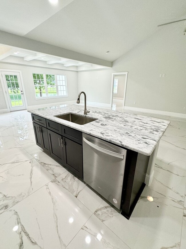 Foto del edificio - LOOK AT THIS ONE! BEAUTIFUL home with a pond view right outside the back patio!