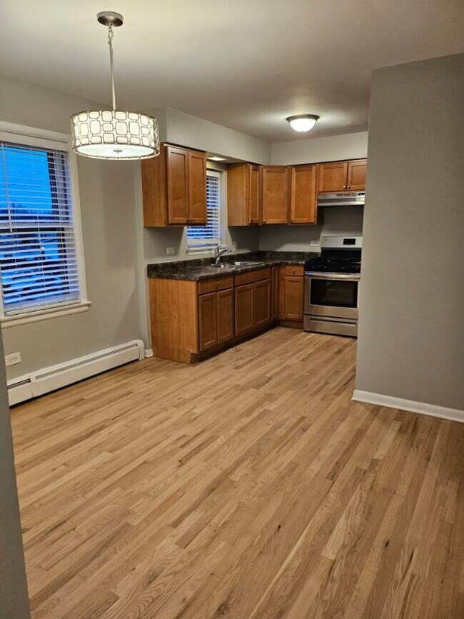 Foto del edificio - 5858 W Diversey Ave