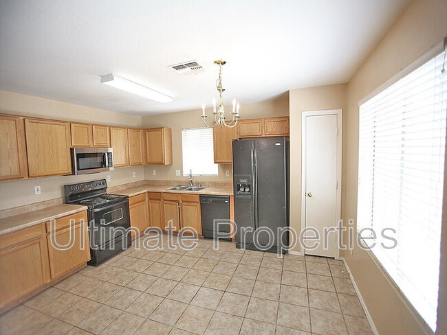 Foto del edificio - 12915 W Lawrence Ct