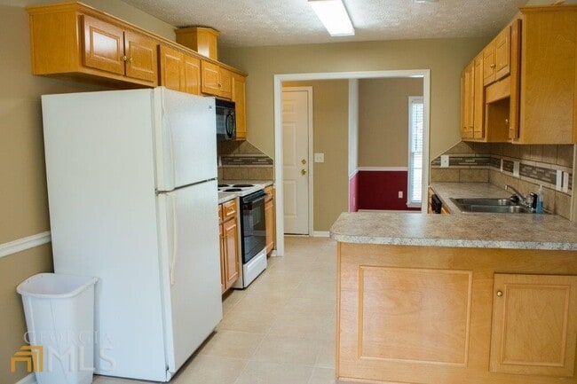 Building Photo - 8037 Creekland Dr