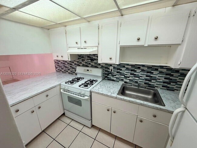 Building Photo - 1300 W 47th Pl