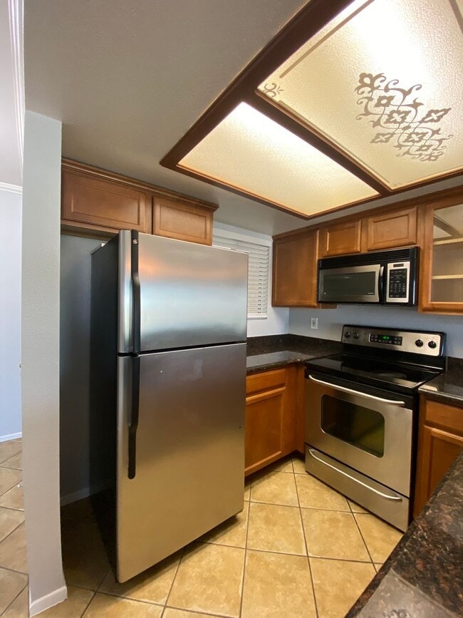 Building Photo - The Palms Condo