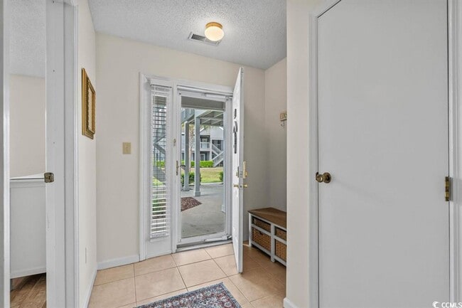Building Photo - Ground floor, 2 bedroom, 2 bath, end unit- 10 mins to Surfside Beach.