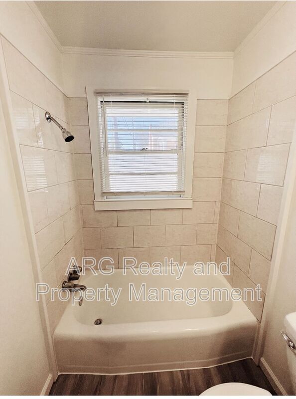 Building Photo - 3026-3028 Stone Mountain St