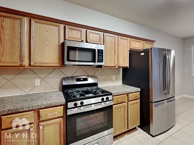 Foto del edificio - 1003 Summer Wood Blvd