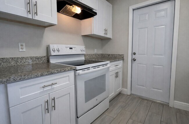 Building Photo - Beautifully Remodeled Lakefront Home – Move-In Ready!