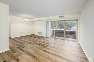 2BR, 1BA - 912SF - Living Room - Rock Creek Woods
