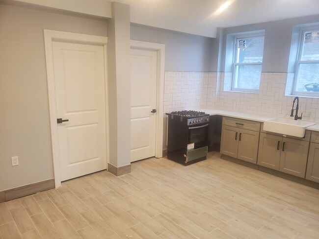 Kitchen #2 Entrance to bedrooms - 3279 Ampere Ave