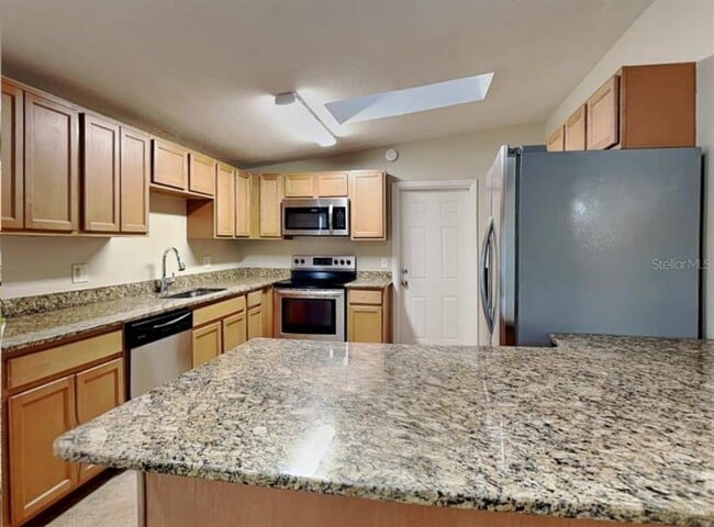 Building Photo - 8025 Excalibur Ct