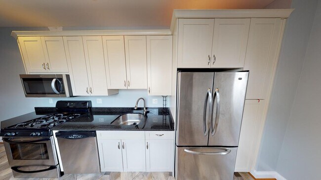 Building Photo - Room in 4 Bedroom Home at 24 S Washington St