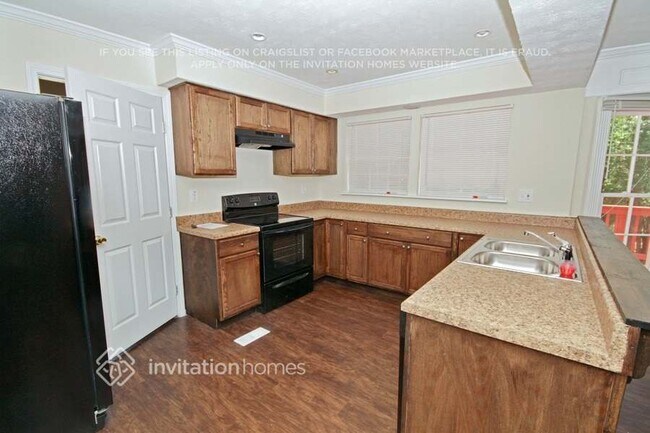 Foto del edificio - 6959 Whispering Oaks Ct