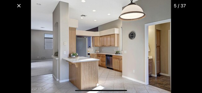 Kitchen & living room beyond - 13606 N Cambria Dr