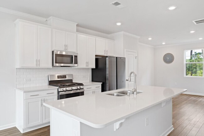Building Photo - Charming 3-bedroom, 3.5-bathroom townhouse located in the heart of Durham, NC!