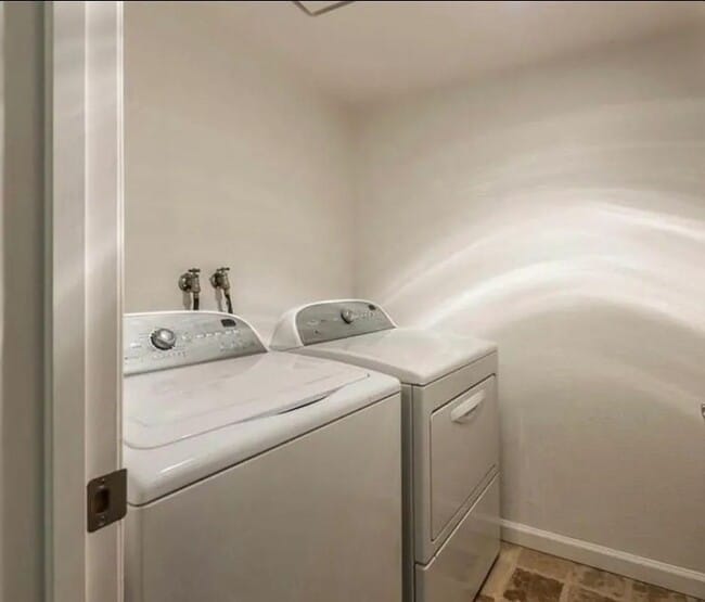 Building Photo - Beautiful 2-Bedroom Condo with Serene Wate...