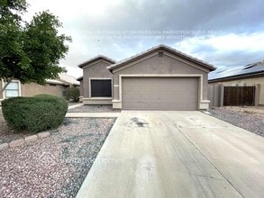 Building Photo - 10728 E Enid Ave