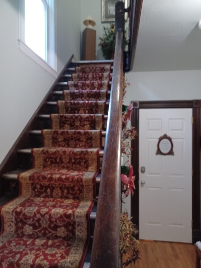 Oak bannistered stairway - 3919 S 48th St