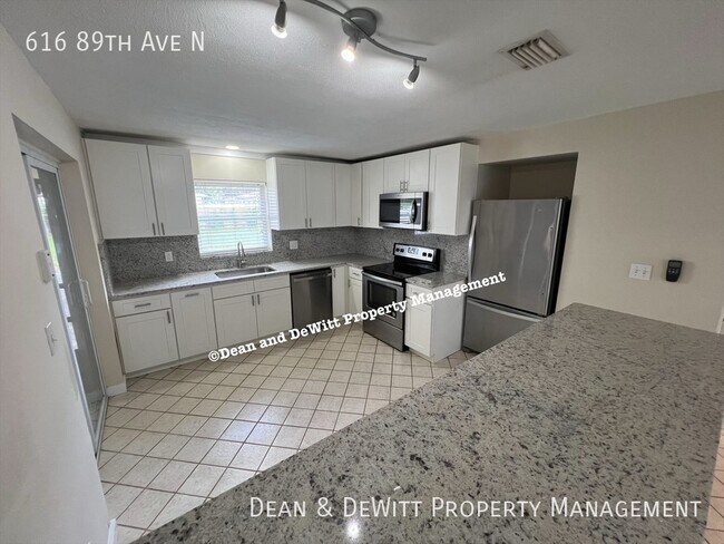 Photo - 616 89th Ave N House