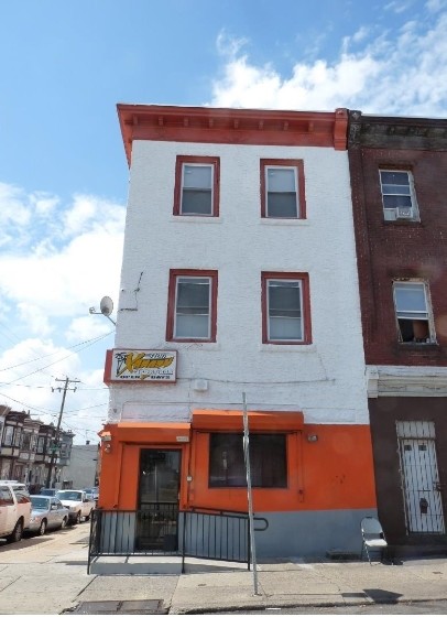 Front Building Photo - Retail/Apartment Building